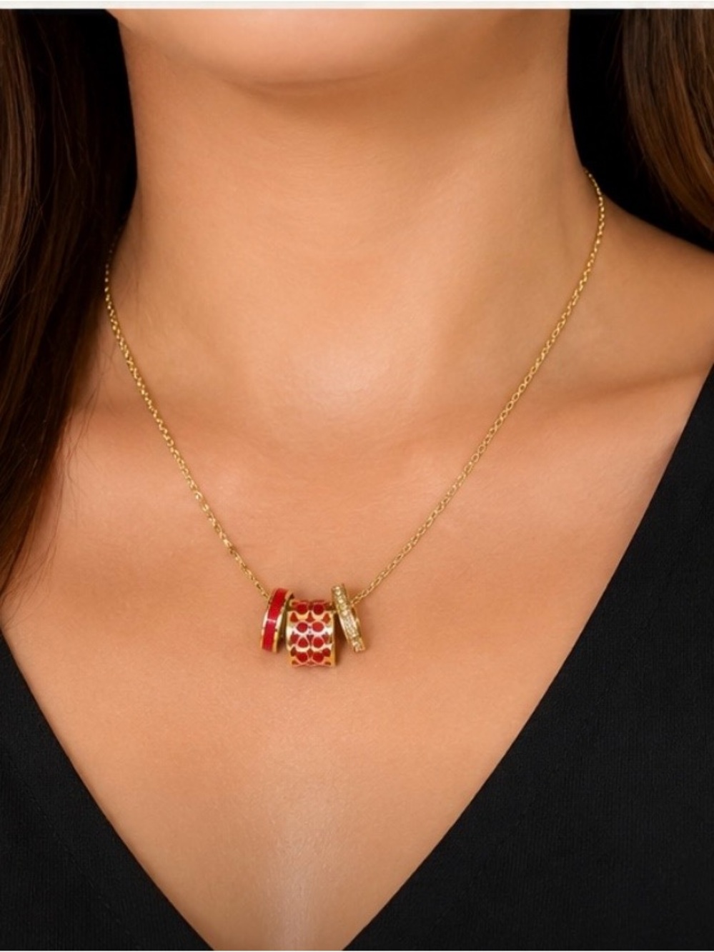 COACH Gold-Tone Necklace with Red Enamel and Crystal Rondelles